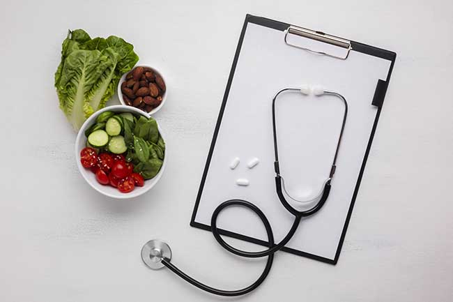 flat lay salad bowl stethoscope scaled 1
